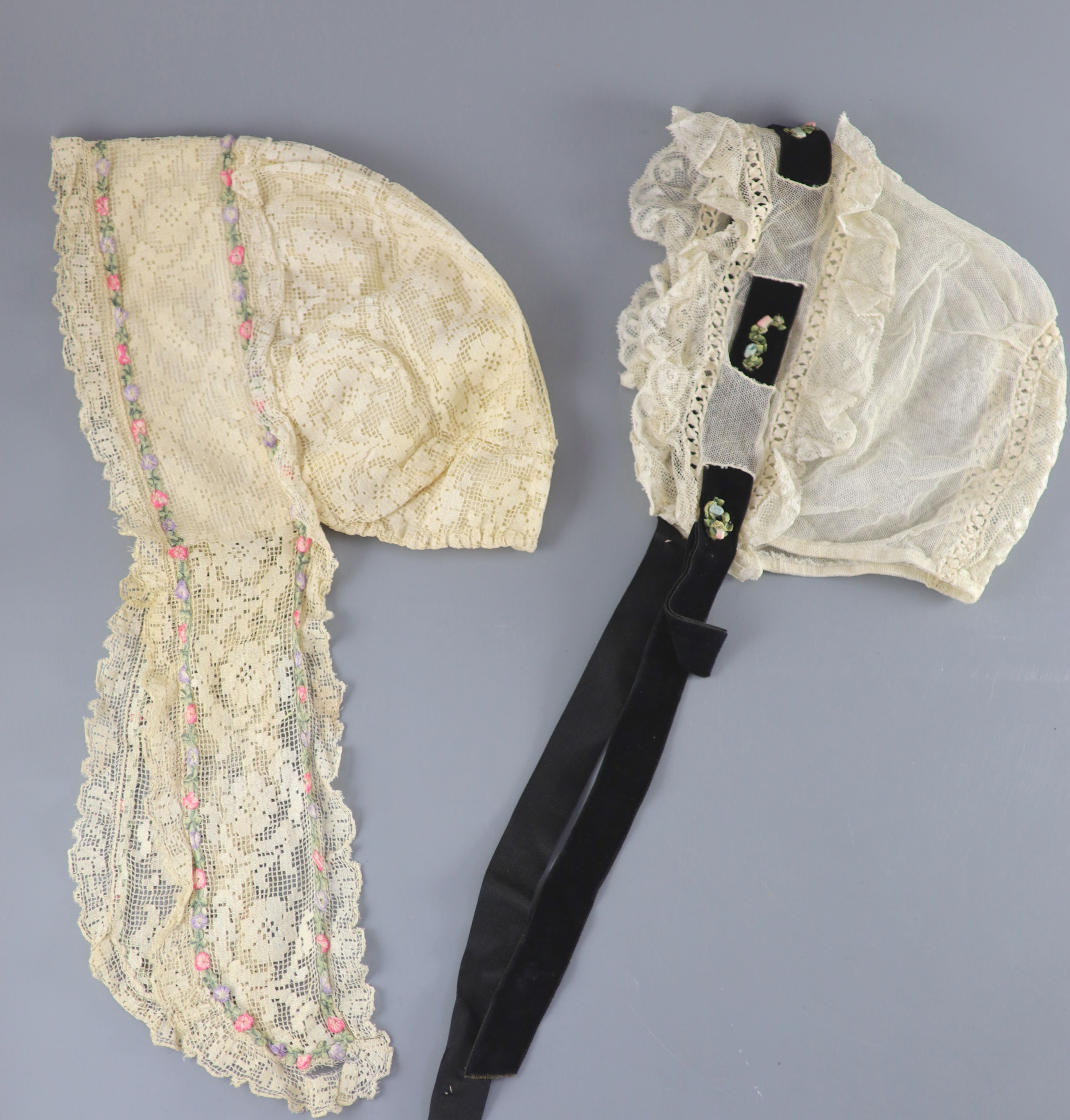 A fine white worked embroidered lace inset coverlet, a filet lace square of a figure wearing a crown (plus museum note),